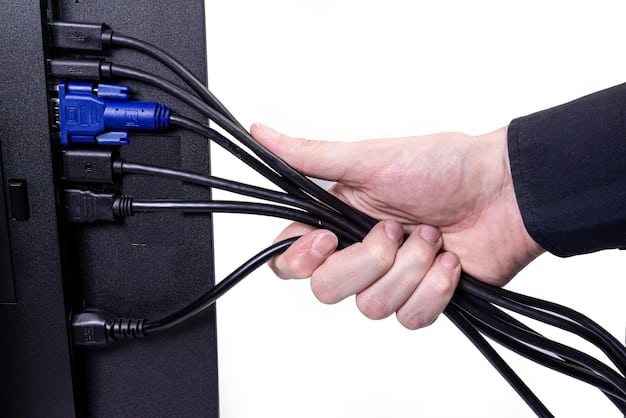 A photograph depicting a person checking the power cord and connections on the back of a printer, ensuring all cables are securely plugged in and functional.