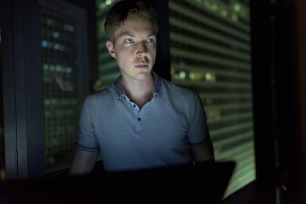 A network security administrator adjusting firewall settings, with a clear focus on ransomware protection rules. The image should convey the importance of proactive network security measures and the technical expertise required.