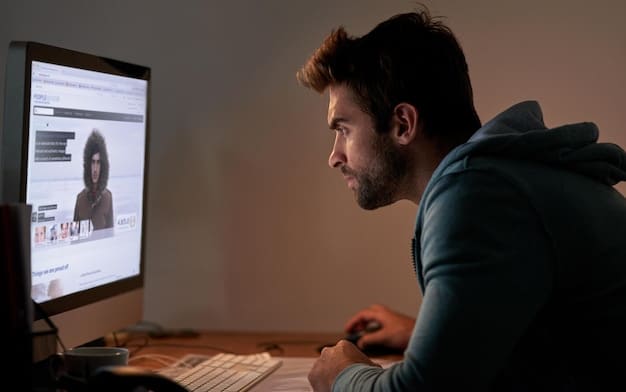 An employee looking confused at a phishing email on their computer screen, highlighting the need for better training to identify such threats.